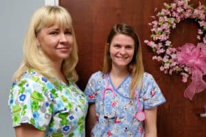 Two nurses in the hallway of Richwood Nursing & Rehab