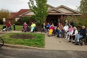 Several residents sitting out front the Richwood Nursing & Rehab